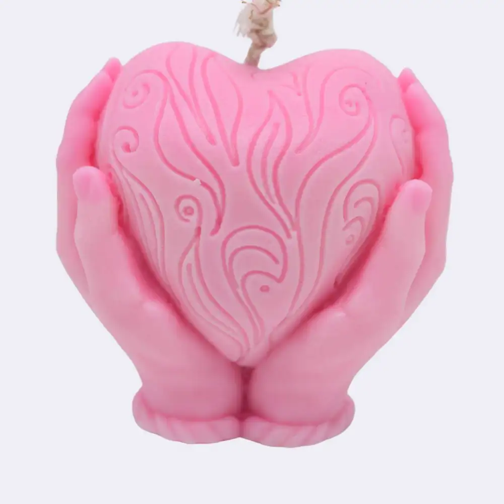 Dekokerze "Herz in den Händen",pink